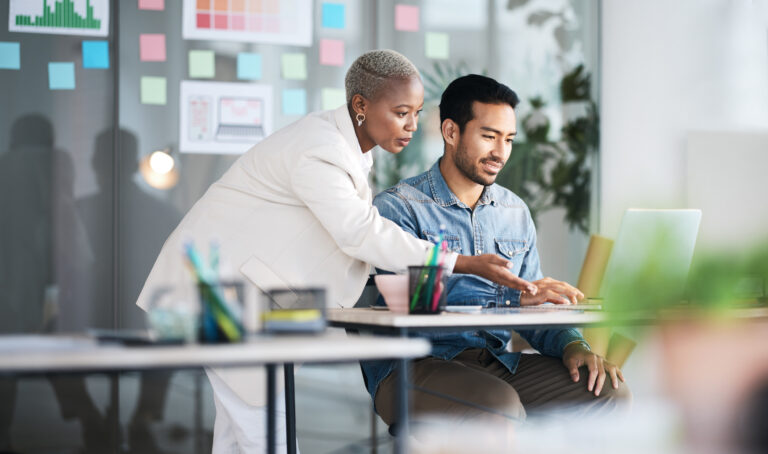 Office laptop, diversity and business people reading online report, website design feedback or research project